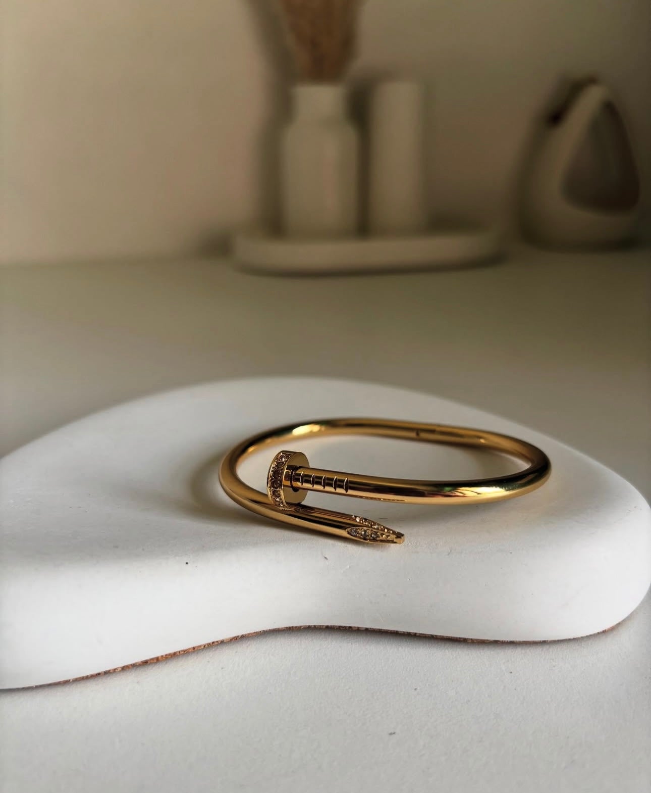 Anti tarnish nail bangle with stone