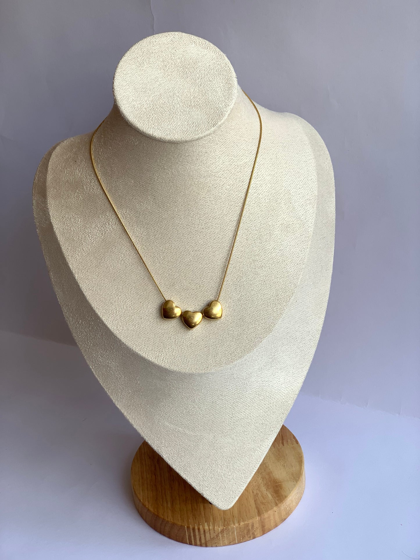 Anti tarnish triple heart necklace