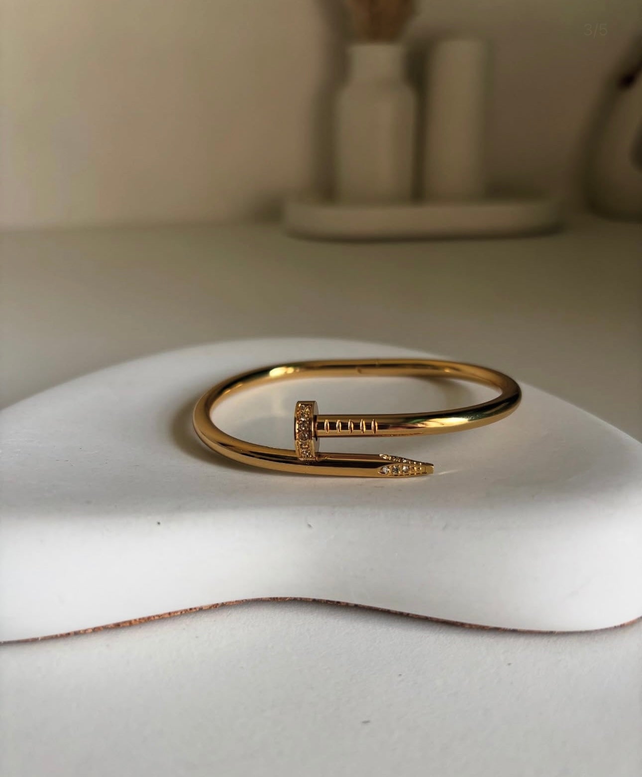 Anti tarnish nail bangle with stone